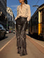 Pantalone in ecopelle con frange