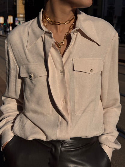Camicia beige con tasche