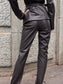 Pantaloni in ecopelle testa di moro con spacchi al fondo