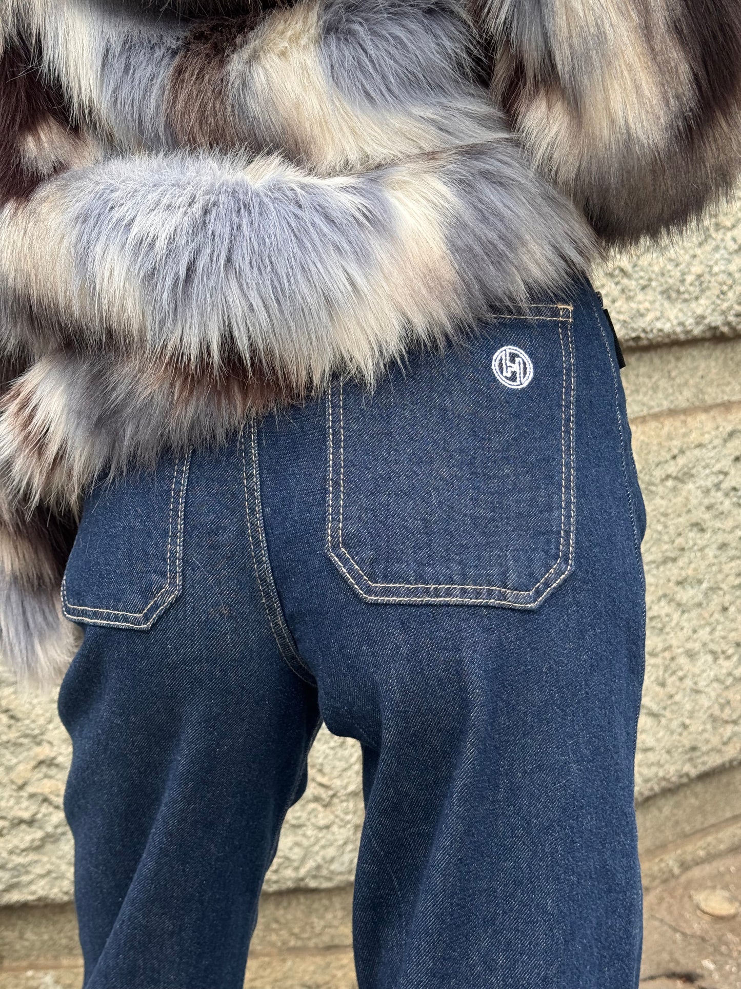 Jeans a gamba ampia con tasche frontali