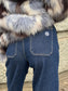Jeans a gamba ampia con tasche frontali