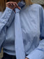 Camicia azzurra con cravatta