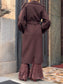 Cappotto con manica a sbuffo e cintura