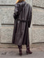 Trench lungo in ecopelle con fibbia