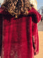 Pelliccia bordeaux lunga con maxi collo