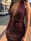 Abito lungo bordeaux in paillettes con scollo profondo