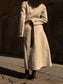 Cappotto beige lungo con collo in pelliccia rimovibile