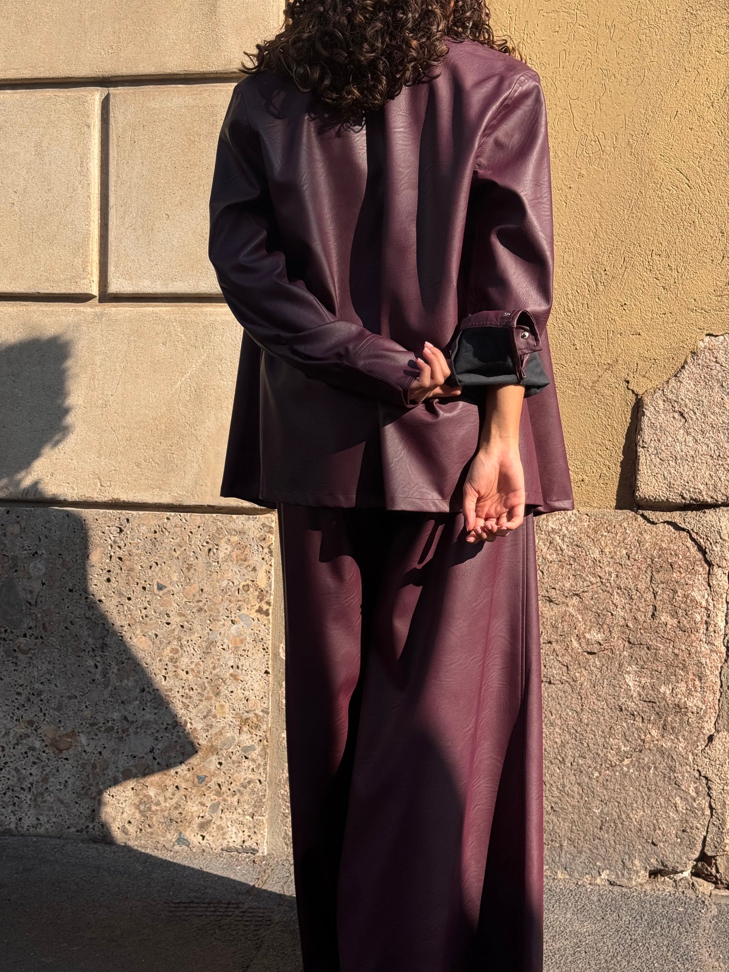 Pantaloni palazzo in ecopelle con vita elasticizzata