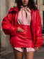 Camicia a righe con cravatta e spalline imbottite